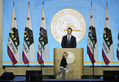 gavin-with-ca-flags